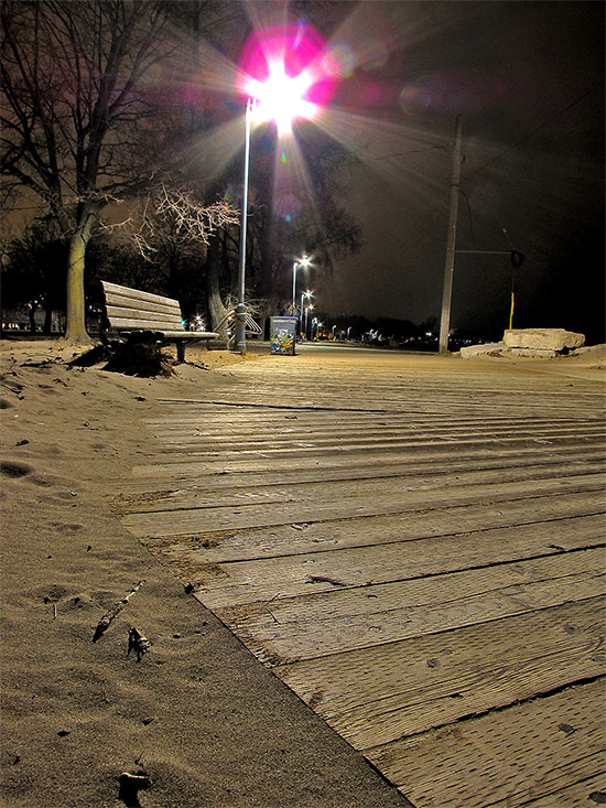 woodbine beach, park bench, boardwalk, light pole, sand, winter, night, toronto, city, life