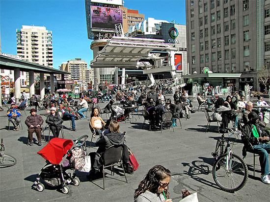 sun tanning, relaxing, sunning, yonge-dundas square, yds, toronto, city, life