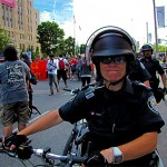 Random image: smiling police state! evil evil evil!